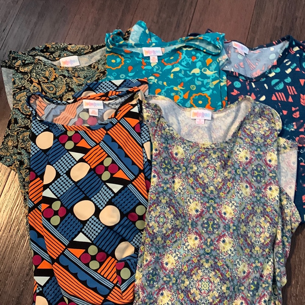 5 Lularoe Irma’s 3 xs, 1 s, and 1 medium